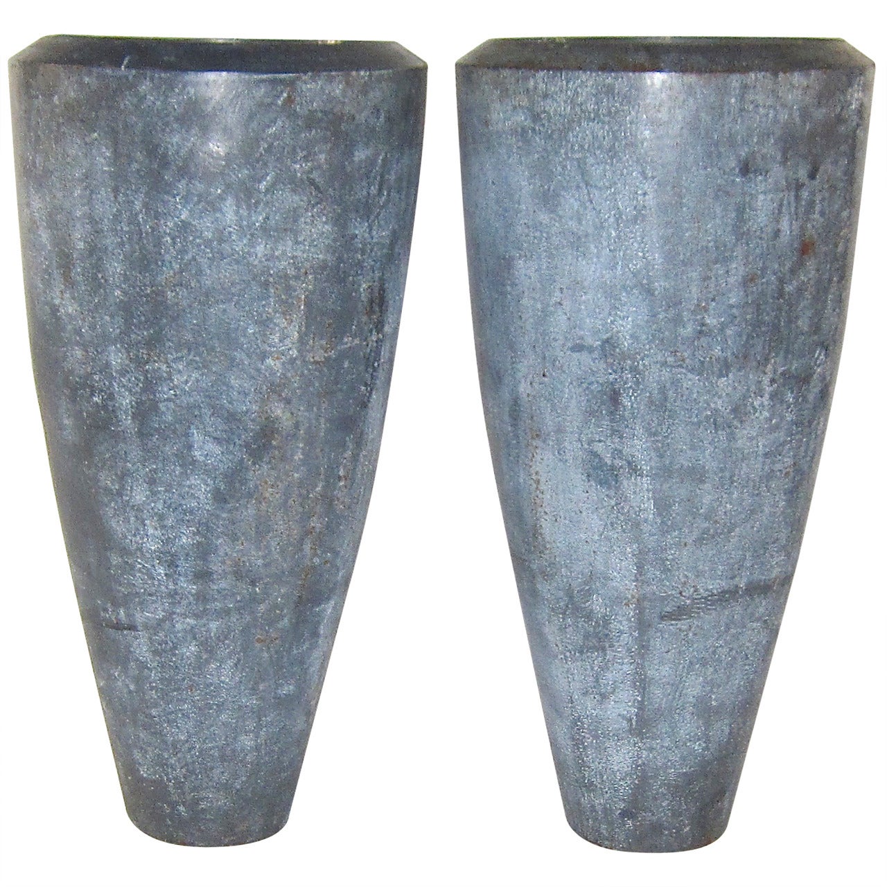 A Pair of Industrial Urns