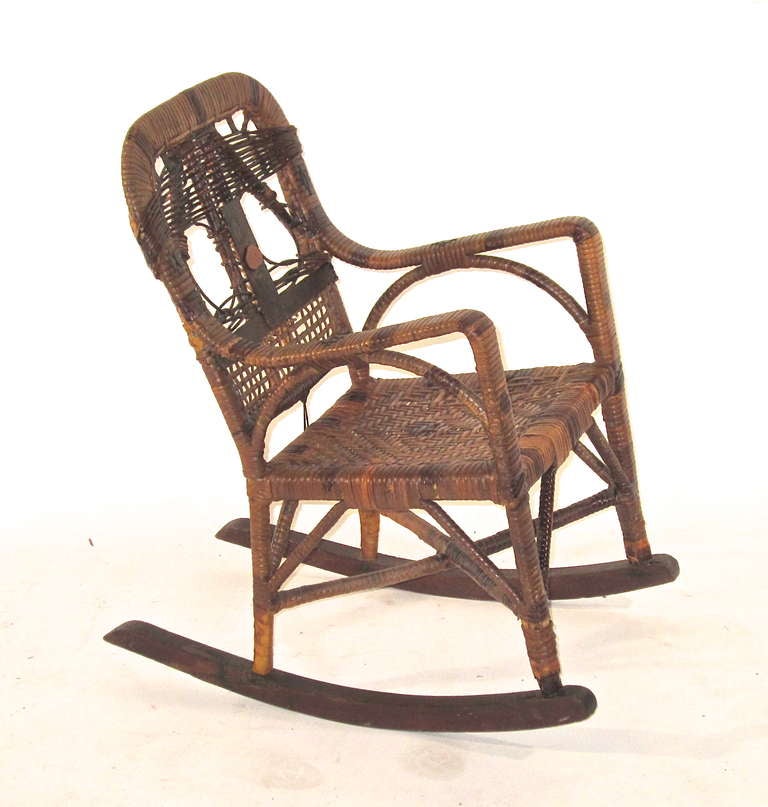 This charming child's rocker  is structurally sound and complete in every detail.
