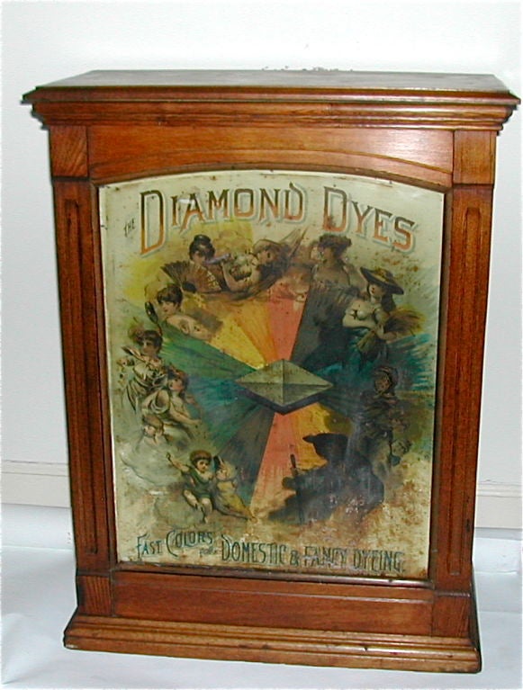 The Evolution of Women embossed litho on tin original display
This country store point of sale display was a popular method of marketing in the late 19th and early 20th centuries. The Diamond  Dye Company produced many tin front decorated versions.