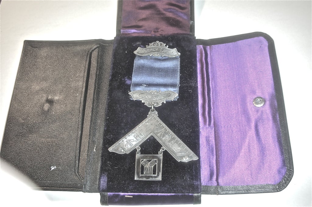 A silver Past Master's jewel or badge of office from Waverly Lodge number 301 of the Grand Lodge of see and Accepted Masons, New York, in a leather presentation case presented to Charles O'Wolfe in 1899