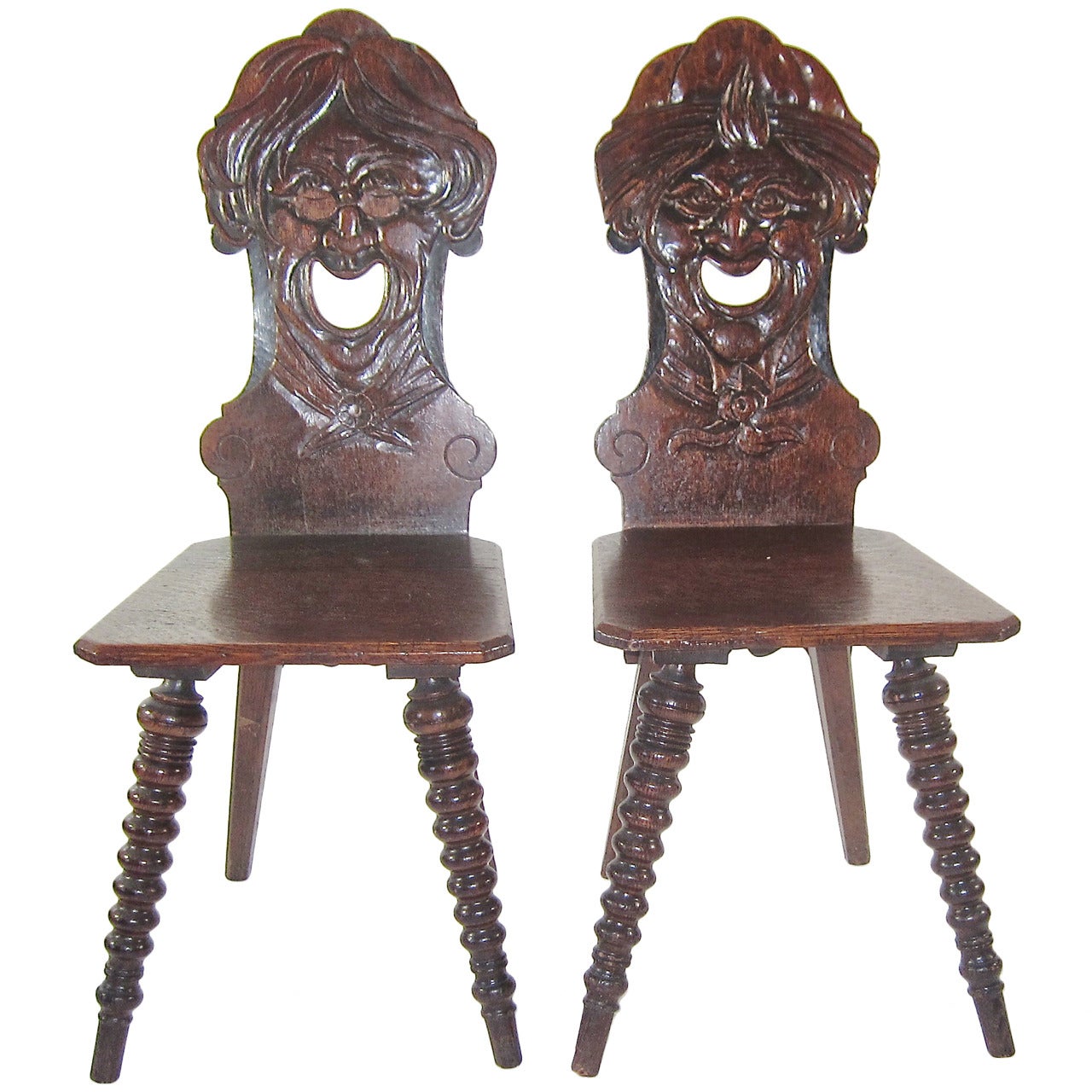 Two Stabellen Carved-Face Chairs For Sale