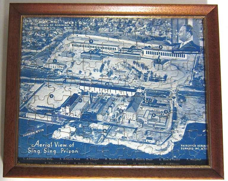 A Fairchild Aerial Surveys view of Sing Sing Prison on the Hudson River  was distributed by Sloan's Liniment Co. of New York City. This framed and hard to find condition of this jig saw puzzle depicts not on ly the view  from the sky but a small