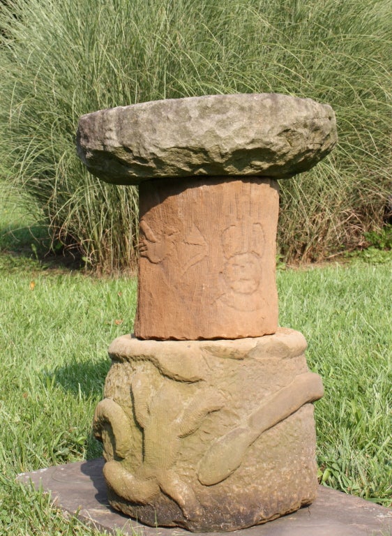 This three sectioned bird bath has a snake, turtle, Indian chief, tomahawk, muskrat and several other carved items.
Ernest 