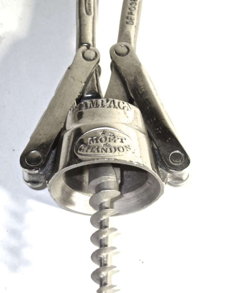 A French made corkscrew marked Moet et Chandon , c. 1903. This  common style cork screw is not found often .The condition is very good, showing signs of gentle use.