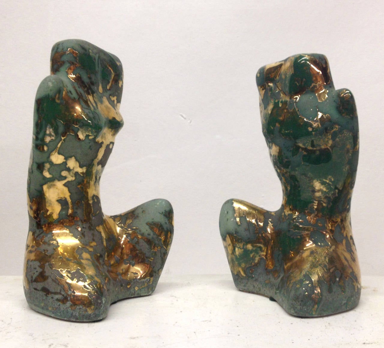 American Gilded and Oxidized Man and Woman Sculptures