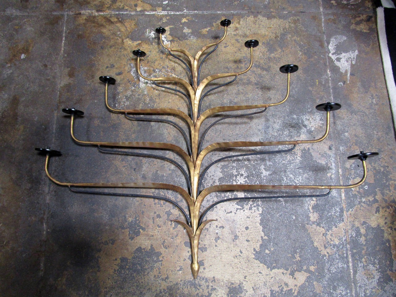 Hammered metal candelabra with ten candle arms, hanging only not stand alone. Beautiful and unique piece.