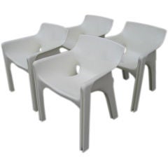 A Set of  4  "Gaudi"  Stacking Chairs by Vico Magistretti
