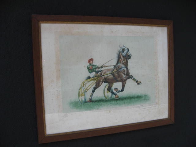Color lithograph captures a vivid harness racing scene. The driver rides on the light, two wheeled carriage known as a sulky. Signed by the artist and numbered : 108 of 300.