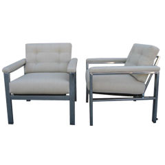 A Pair of Arm Chairs after Milo Baughman