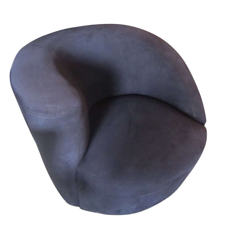 This Classic nautilus chair by Vladimir Kagan for Directional swivels 180 degrees.