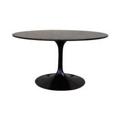 Black Pedestal Tulip dining table  by Eero Saarinen