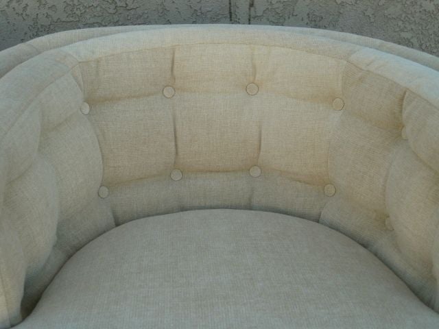 American A Pair of Barrel Swivel Chairs