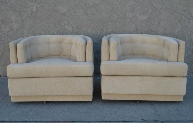 A Pair of Barrel Swivel Chairs 1