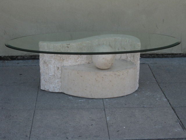 Coffee table constructed of a glass top surface and  a tessellated marble base by Magnussen Presidential Furniture Company from the 1980s.
