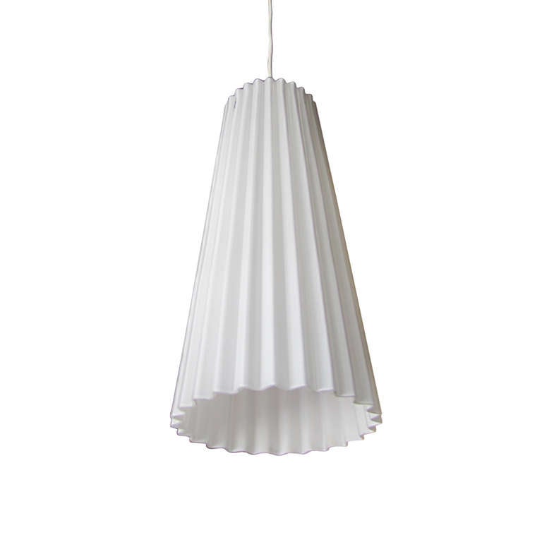 This hanging light features a ribbed pendant in opaque white glass which attaches to the ceiling via a circular chrome canopy. 
The length pictured from canopy to bottom of pendant is approximately 80 inches, but it can be adjusted.

**Please see