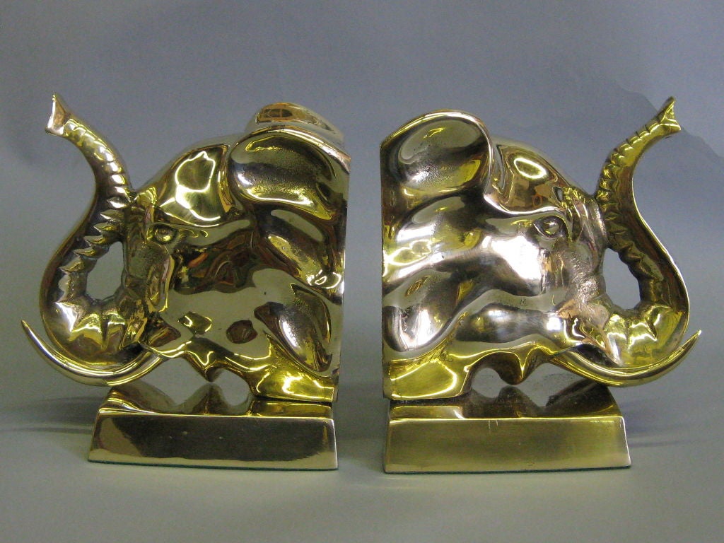 Outstanding set of polished solid brass Elephant head book ends from the 1960’s.  The solid brass casts are in the form of Elephant heads in the 