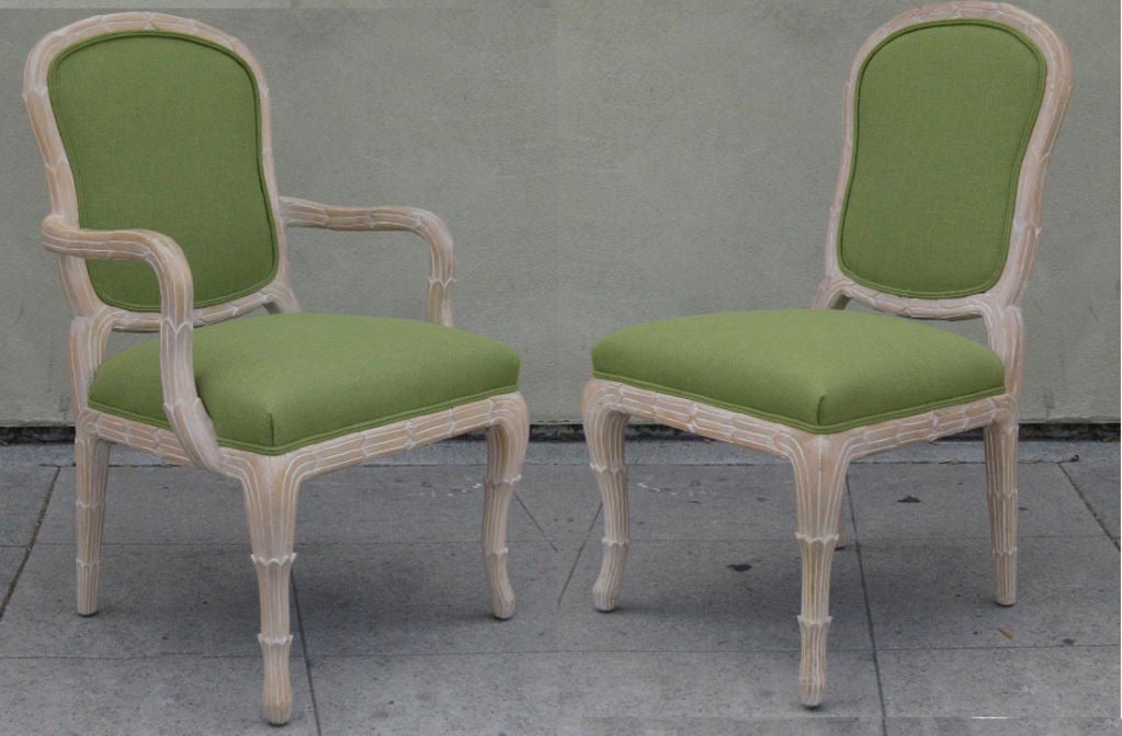 Set of upholstered chairs inspired by the Louis XV style and re-interpreted in the 80s. This is a great example of high quality 1980's craftsmanship and vision.The bleached wood features intricate carved details. Only 2 chairs have been