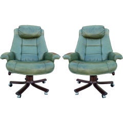 A Pair of Green Leather Adjustable Office Chairs from Norway