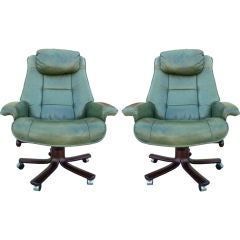 A Pair of Green Leather Adjustable Office Chairs from Norway