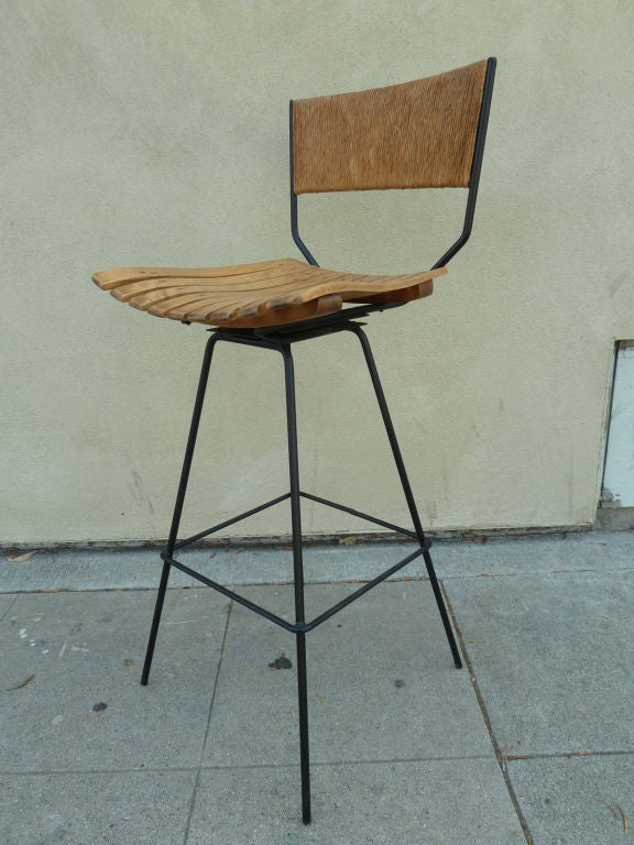 American A Pair of Swivel Bar Stools by Arthur Umanoff