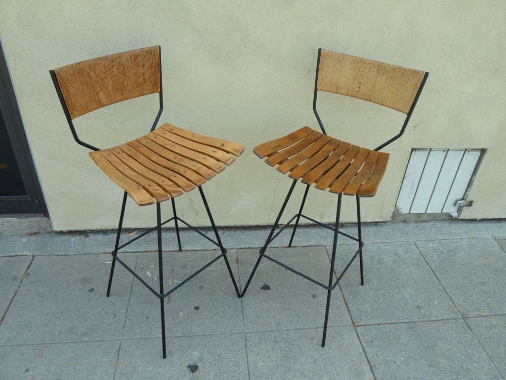 A Pair of Swivel Bar Stools by Arthur Umanoff 1