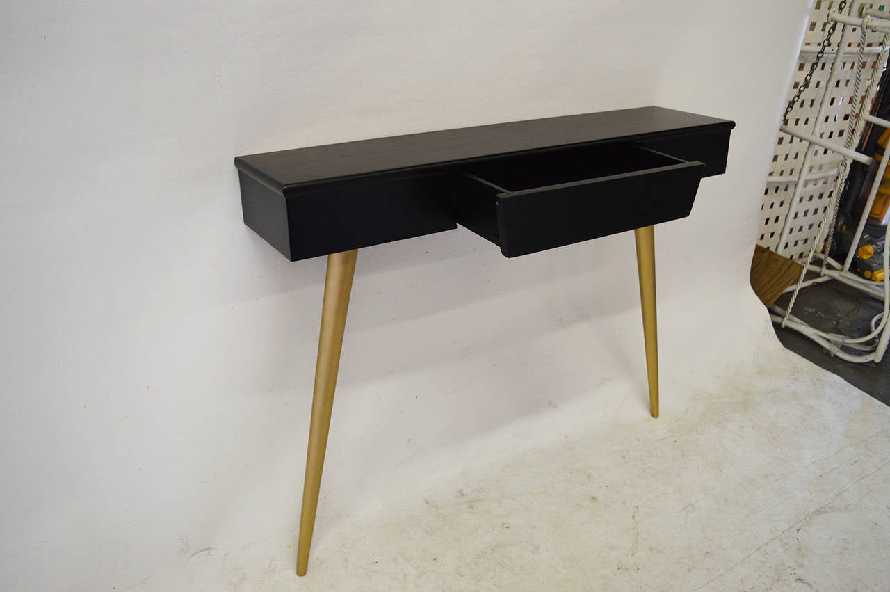 Mid-Century Modern Litlle Ebonized  Console with Gilded Legs