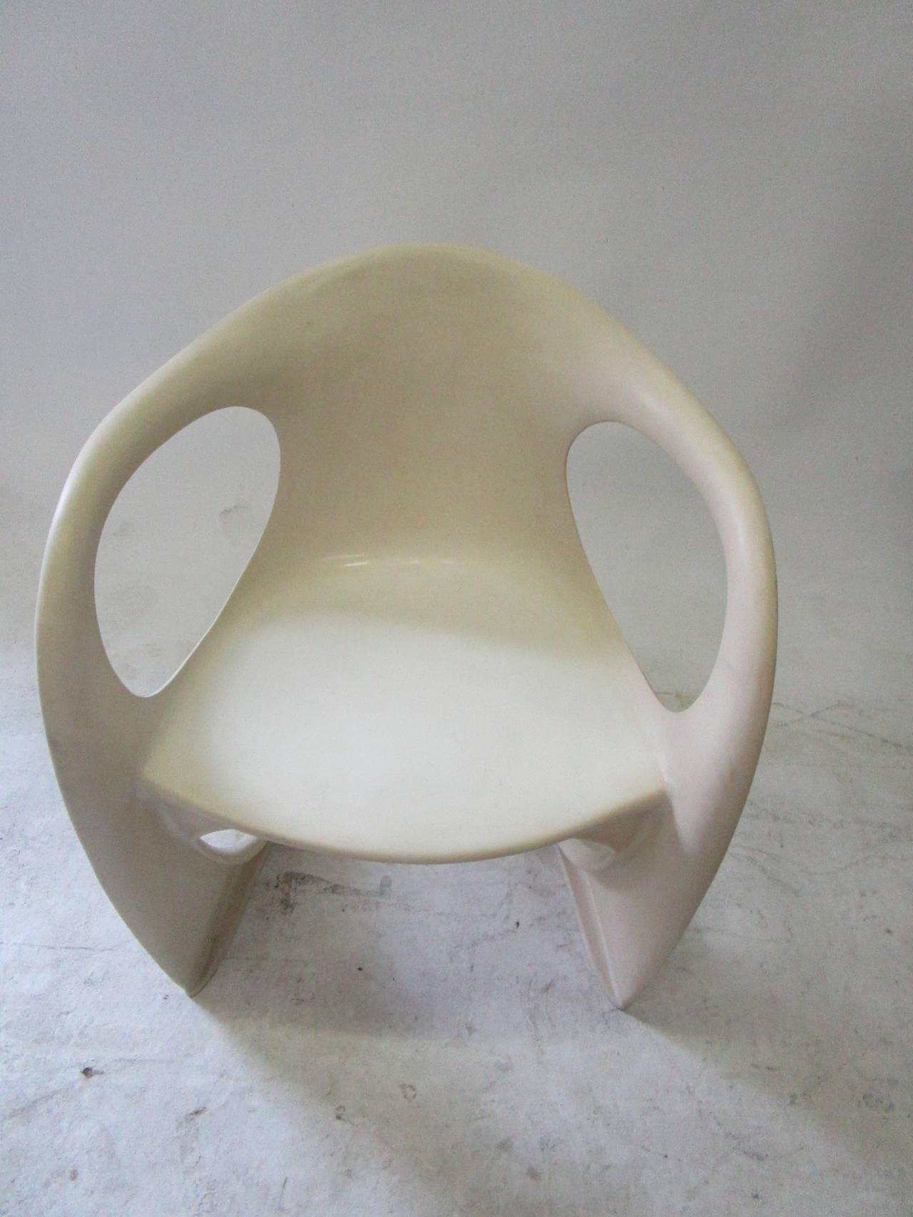 This indoor or outdoor chair is an original one by Ostergaard Steen. An accomplished furniture designer, inventor and architect, he was born in Denmark in 1935 and now resides in France. His exhibits are in France, Germany and Denmark He was