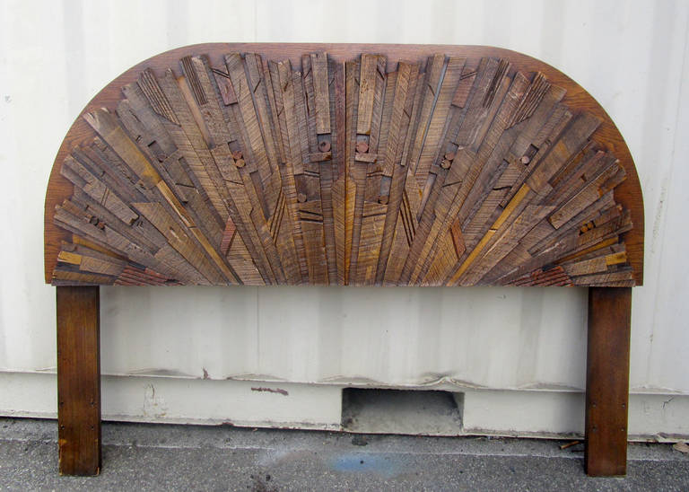 Headboard by Lane featuring a gorgeous Brutalist design in carved wood. Marked on verso with the serial and model numbers.