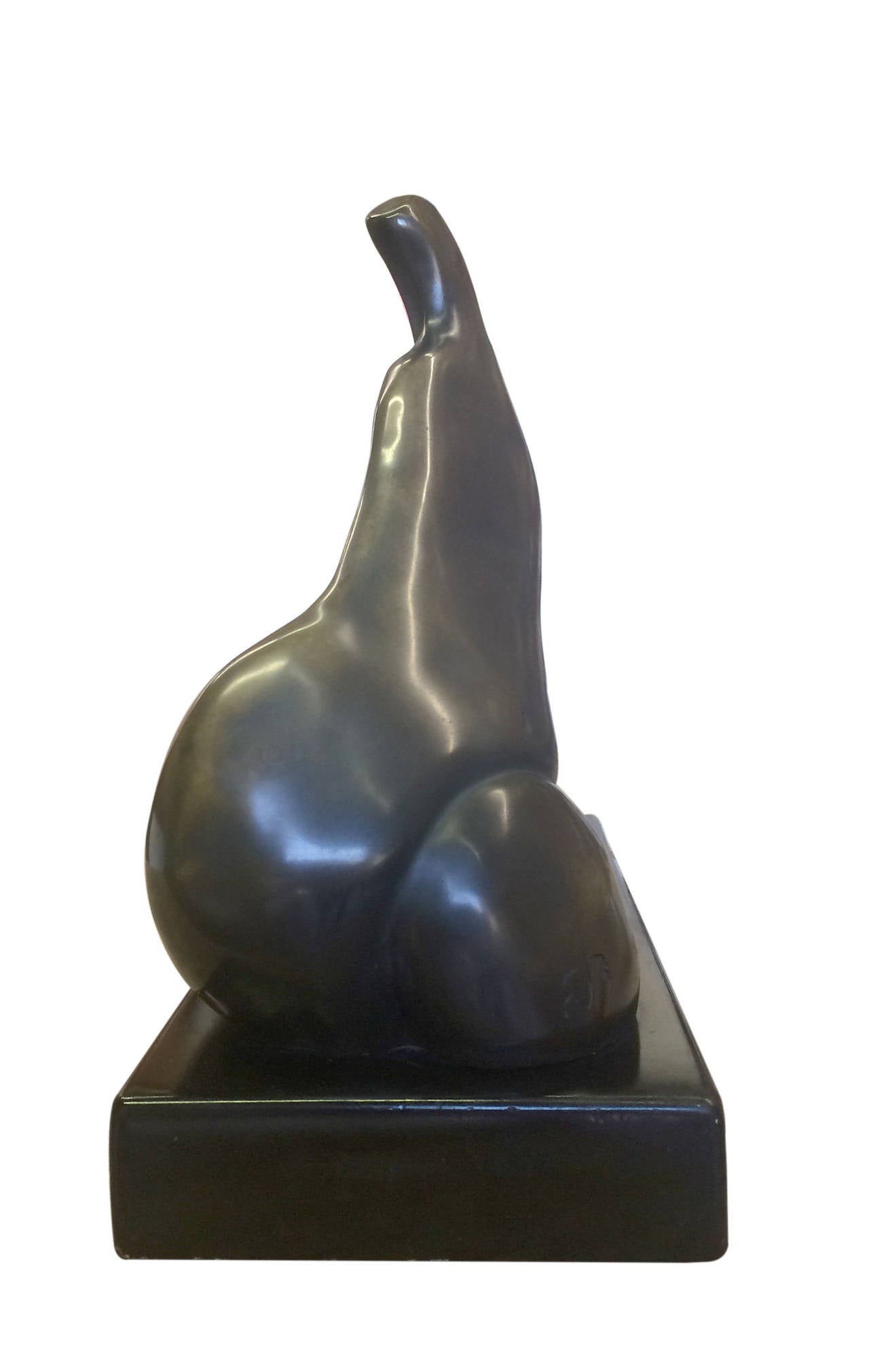 This patinated bronze sculpture partially depicting a nude woman in repose is entitled 