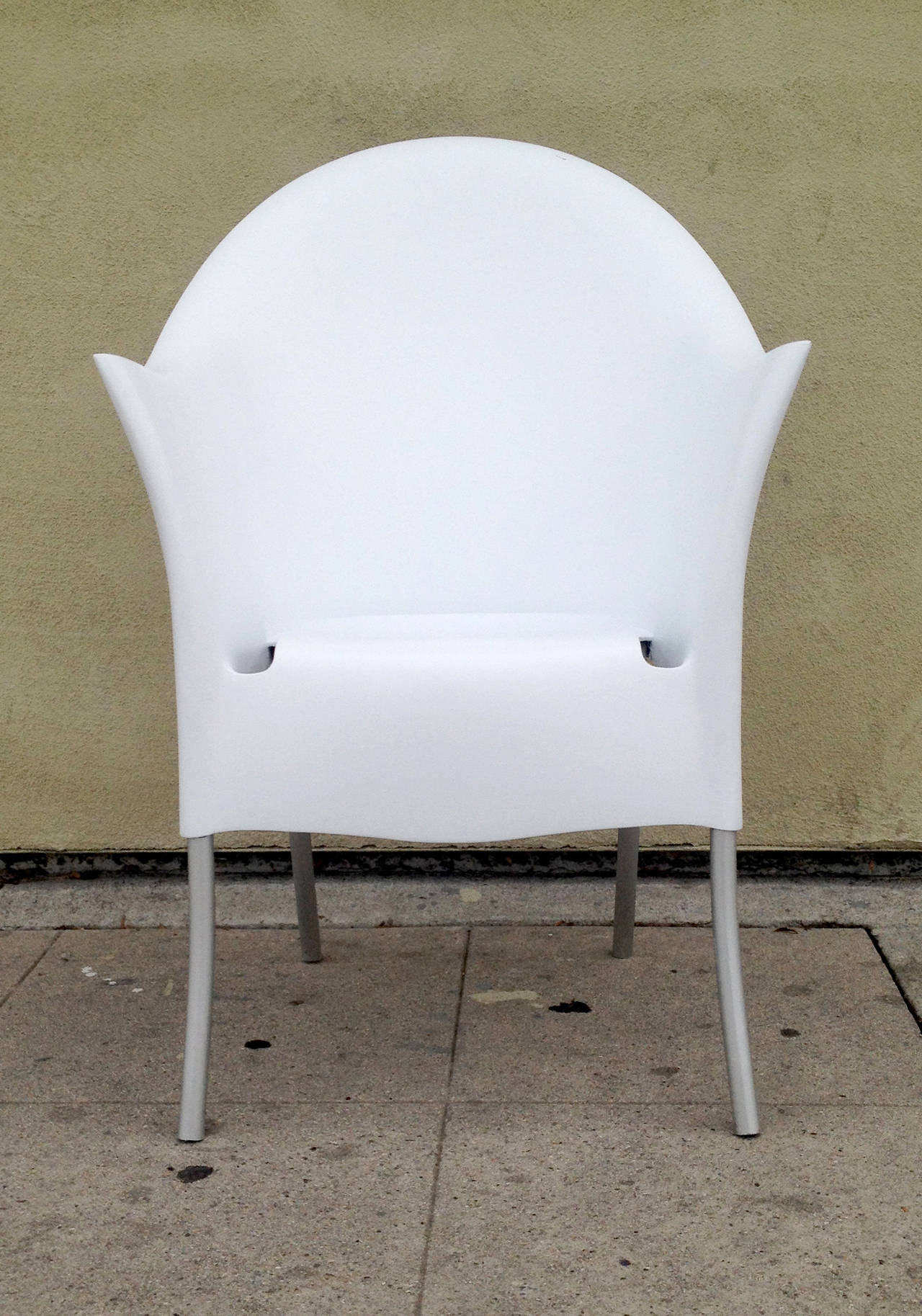 Aluminium structure and anodised aluminium legs and polypropylene shells, these chairs are very comfortable and light.
They are perfect for outdoor with the 2 holes to let the rain escape.