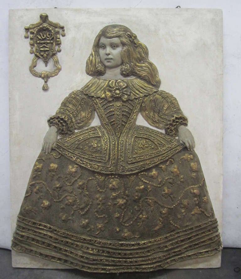 This mid-century plaster relief sculpture depicts Infanta Maria Marguerita from Diego Velazquez's famous 1659 painting of the Spanish princess. The subject is intricately rendered. By Harold Studios Inc.
Purchased from Hollywood estate.