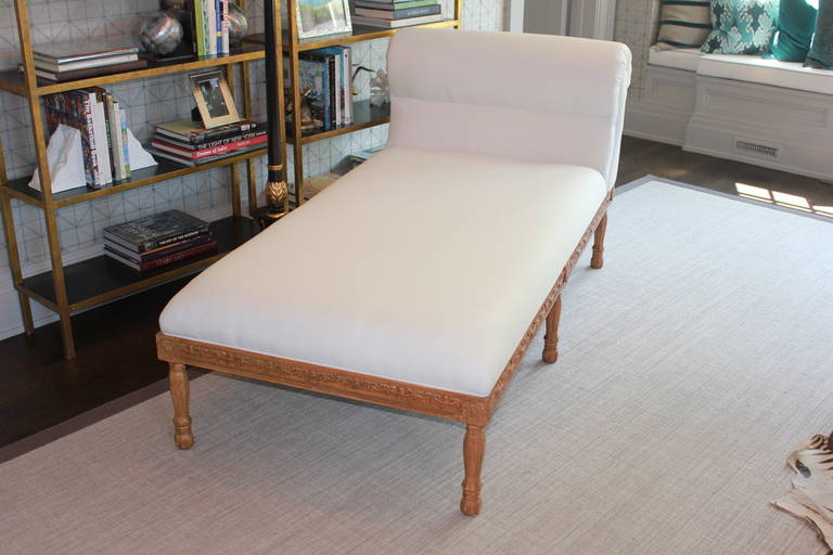 1940s chaise with amazing highly realistic carved detail on frame. Large proportions. Curled back. Super comfortable. From an estate in Palm Beach.