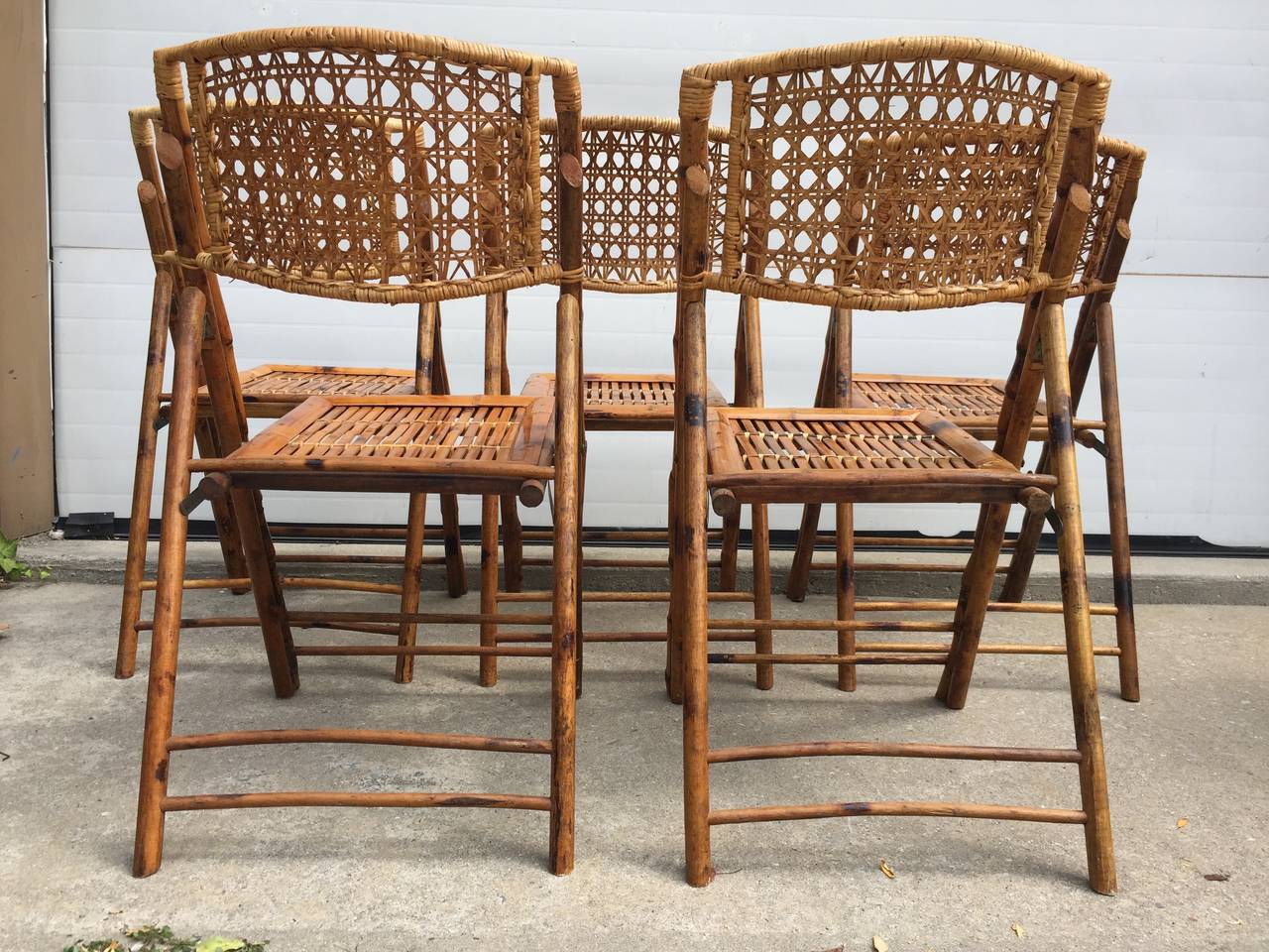 Set of Five Scorched Bamboo Frame Folding Chairs with Rattan Seat and Back In Excellent Condition In Southampton, NY