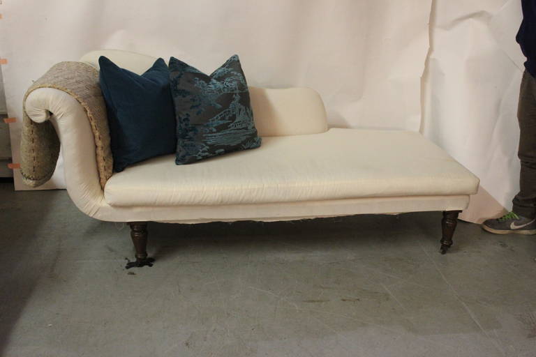 Gorgeous Chaise Lounge Frame, elegant mahogany feet with castors, chaise has gorgeous lines, can be sold as is or redone in your fabric C.O.M. for an additional 1000.00 over listed price. So comfortable. Pillows not included, if desired we can make