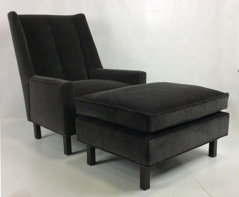 Super stylish and comfortable high back lounge chair by Harvey Probber.  The chair and ottoman have both been refinished and reupholstered in luxurious heavyweight Charcoal Grey velvet.
