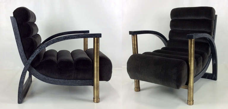 Pair of Jay Spectre eclipse lounge chairs with aged brass legs and cerused ebony frame.  The pair have been freshly refinished and reupholstered in luxurious heavyweight charcoal grey velvet.
