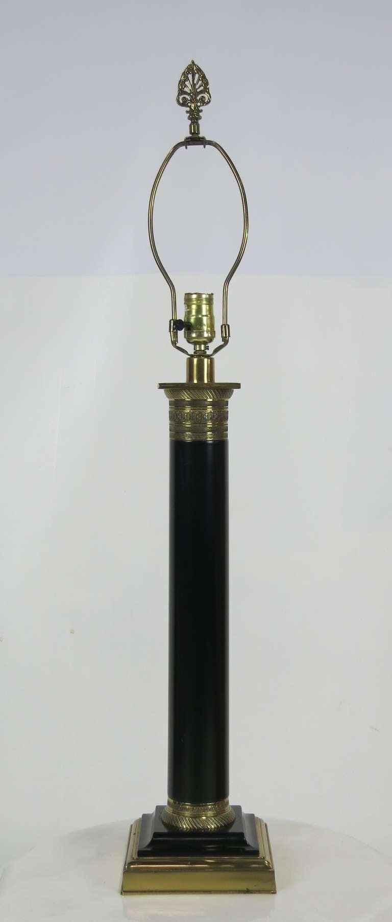 Beautiful Classic Doric Column form lamp with Hand Chased Brass Mounts by Paul Hanson.  Shade is for display only and is not included with lamp.  