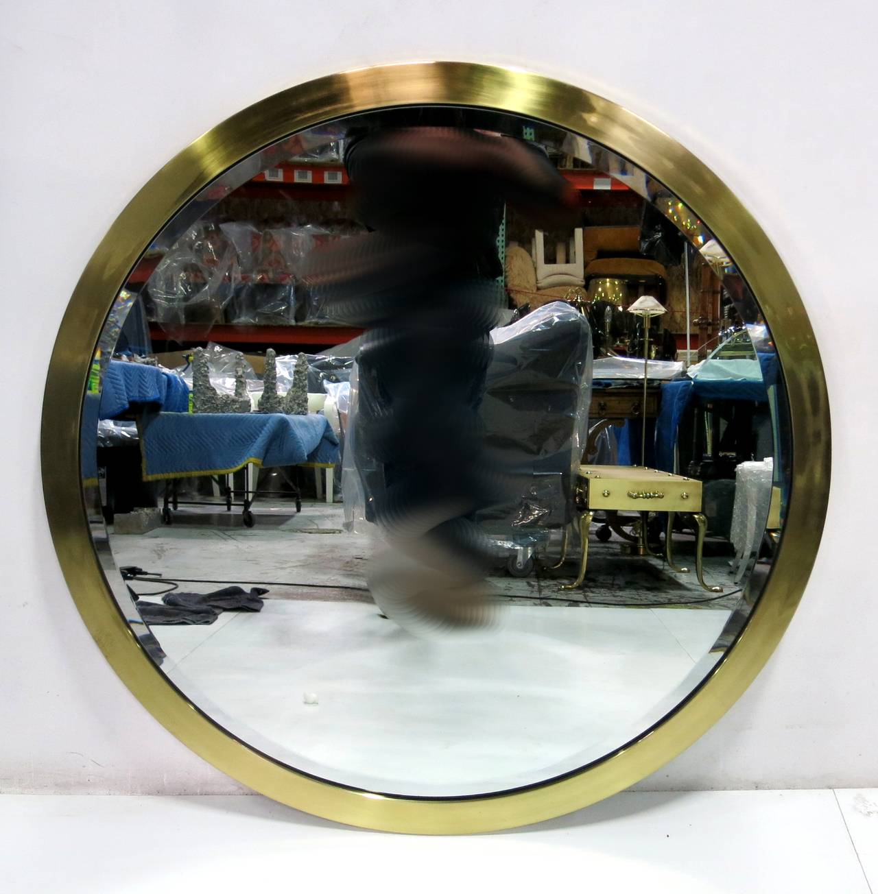Fantastic brass framed round bevelled mirror.