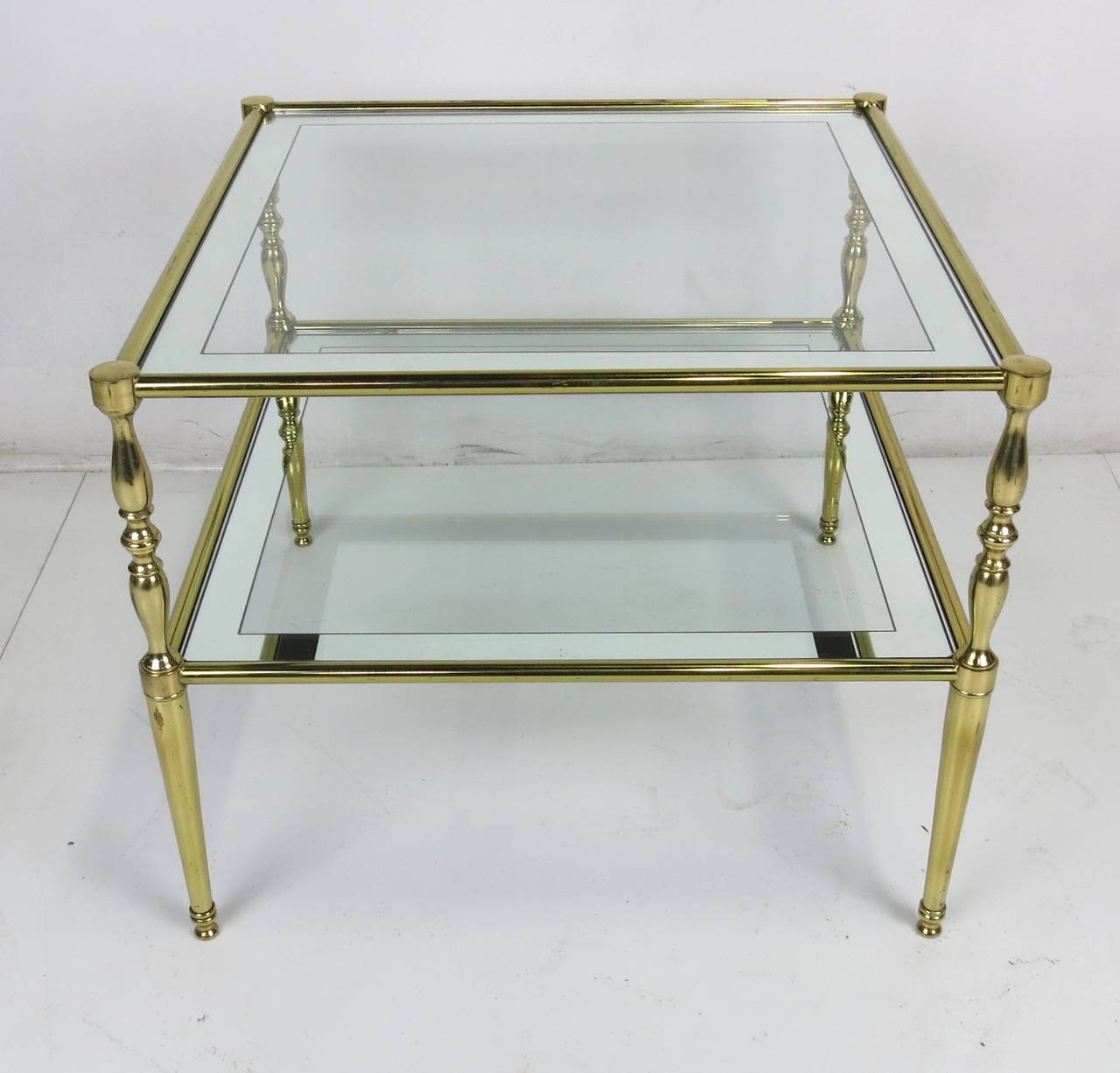 Solid brass Side Table with Mirrored Edge Glass Top in the Chiavari style.
