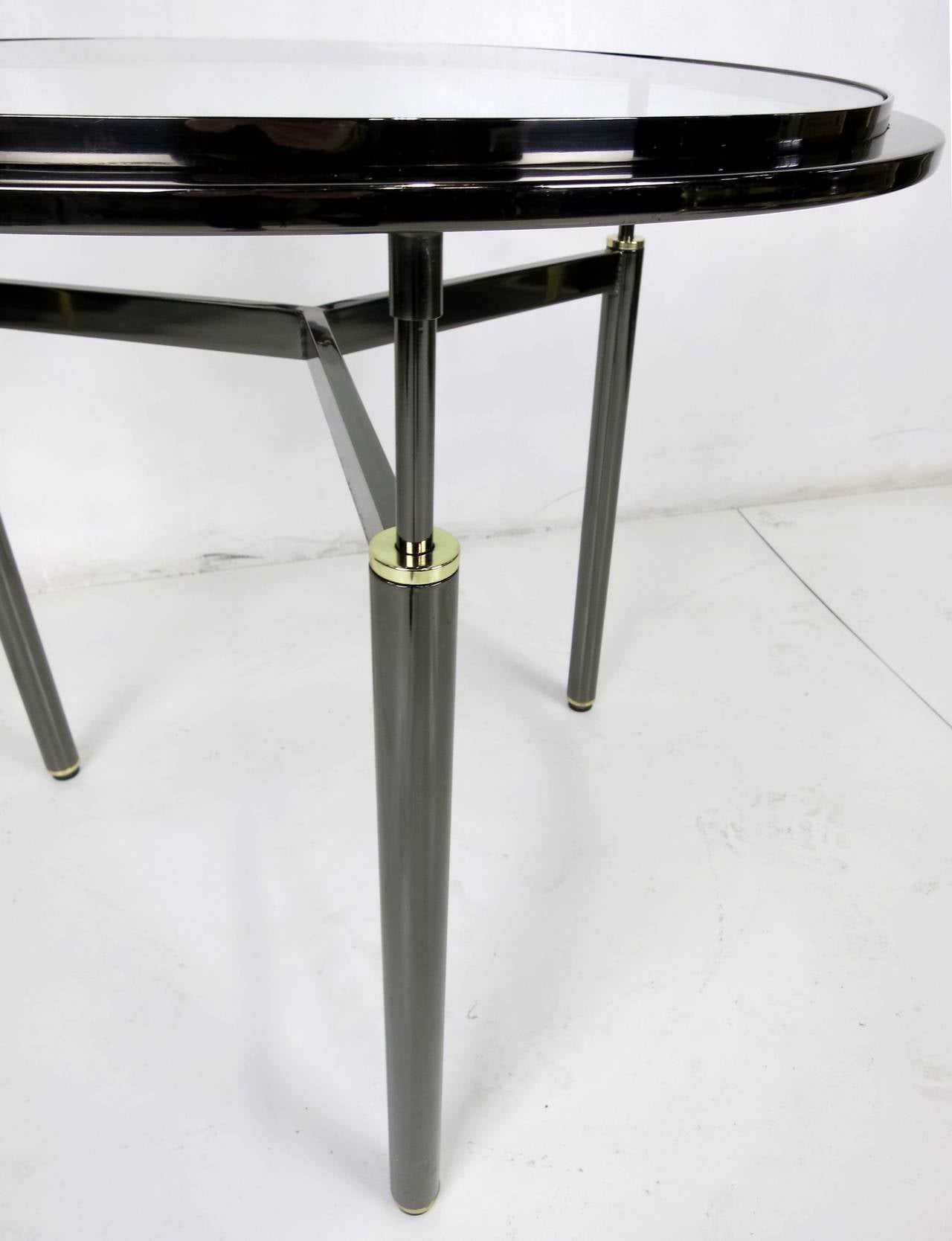 American Pair of Gunmetal and Brass Gueridons/Side Tables