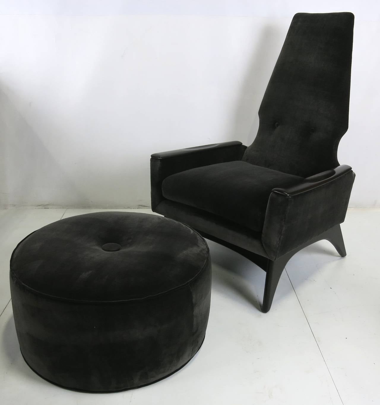 Lounge chair and ottoman by Adrian Pearsall for Craft Associates. The chair and ottoman have been painstakingly restored; refinished, and reupholstered in charcoal grey velvet.