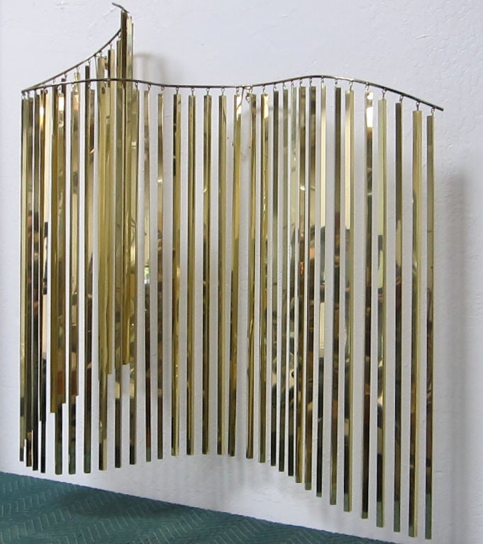 Fantastic large brass curtain wall sculpture by C. Jere. This dramatic piece 