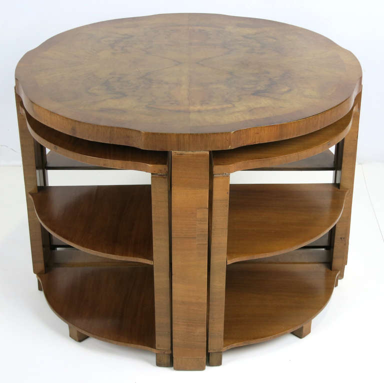 French Deco Coffee or Occasional Table with four petite nesting tables, each with two undershelves.  The top has quarter-matched burl veneer top.