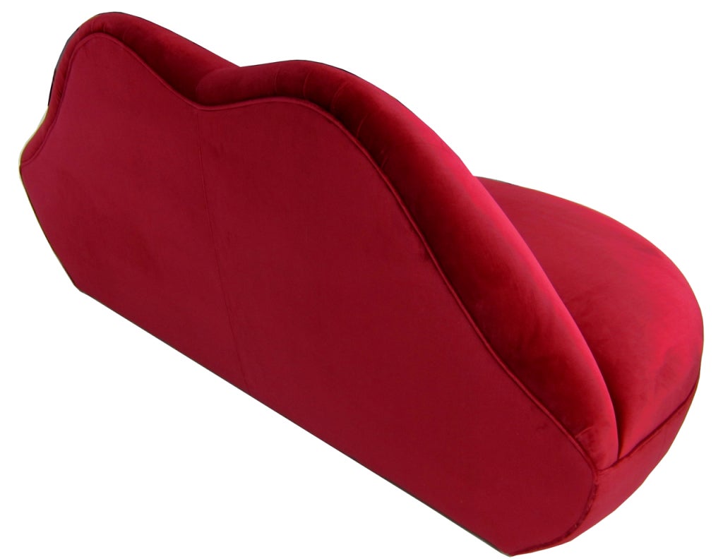 Lips sofa freshly reupholstered in deep red velvet after the original by Salvador Dali for Edward James in collaboration with Jean-Michel Frank.