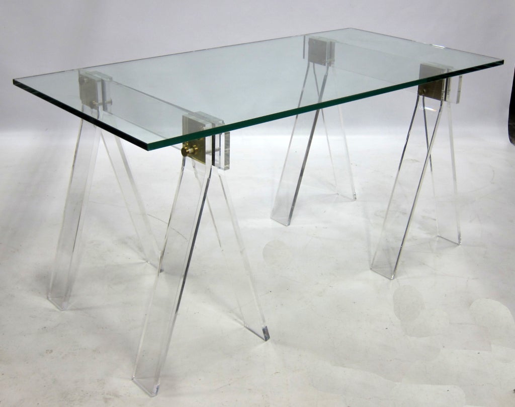 Beautiful pair of thick Lucite Sawhorses with brass hardware and glass top.  The base can accommodate a glass top up to 72 x 48










Keywords-Pace, Albrizzi, Hollis Jones, Springer