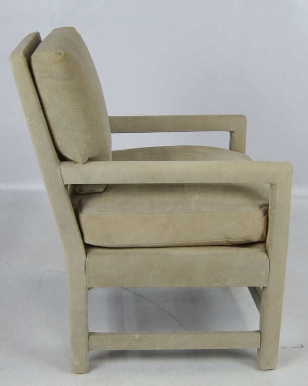 Pair of open-arm lounge chairs upholstered in tan suede by the late and renowned San Francisco designer, William 