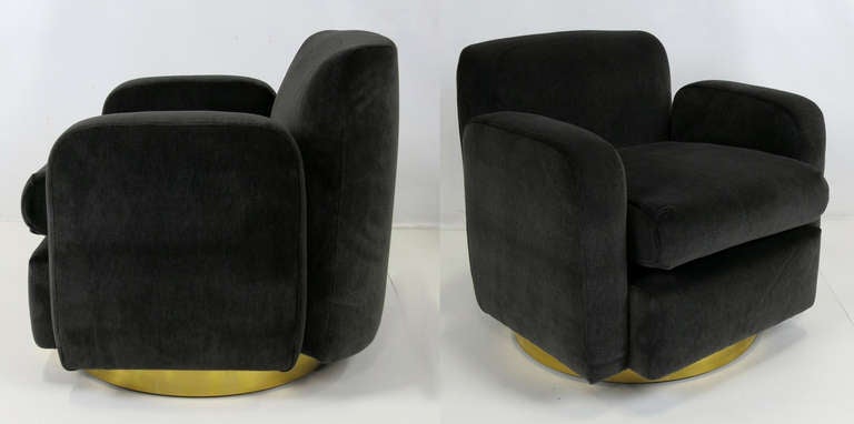 Pair of Mod Swivel Chairs with Brass bases, freshly restored and reupholstered in luxurious heavyweight Charcoal Grey velvet in the style of Paul Evans for Directional.