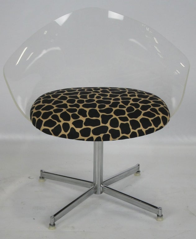 Elegant Lucite desk or vanity chair in Lucite with chrome swivel base.