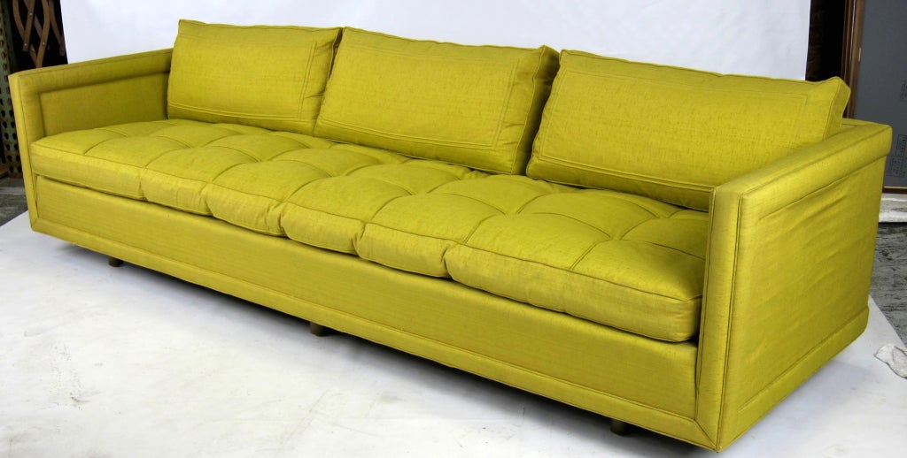 Elegant Tuxedo Sofa raised on recessed legs by Michael Taylor for Baker. This is an extremely high quality piece with a heavy, rigid hardwood frame and down pillows and biscuit tufted down seat cushion.  COM upholstery included in price