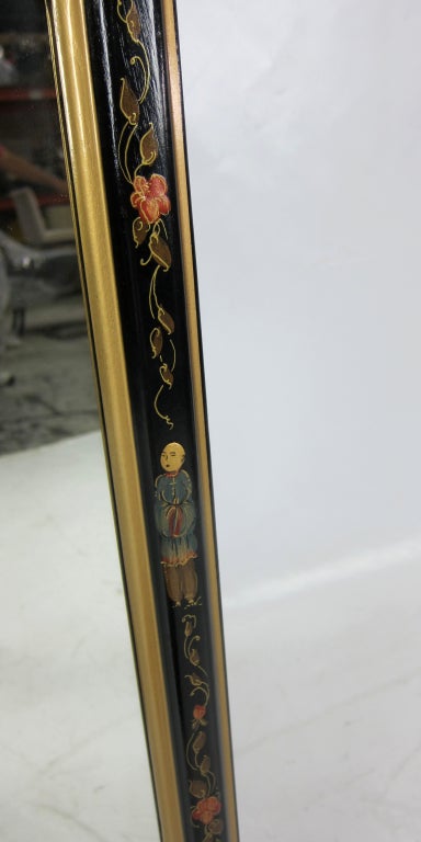 Large pair of black lacquer Chinoiserie Mirrors with decorative painted frames.  Please browse our entire inventory at www.antiquesdumonde.1stdibs.com